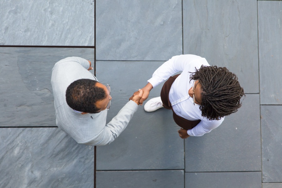 Professionals meeting at a partner business