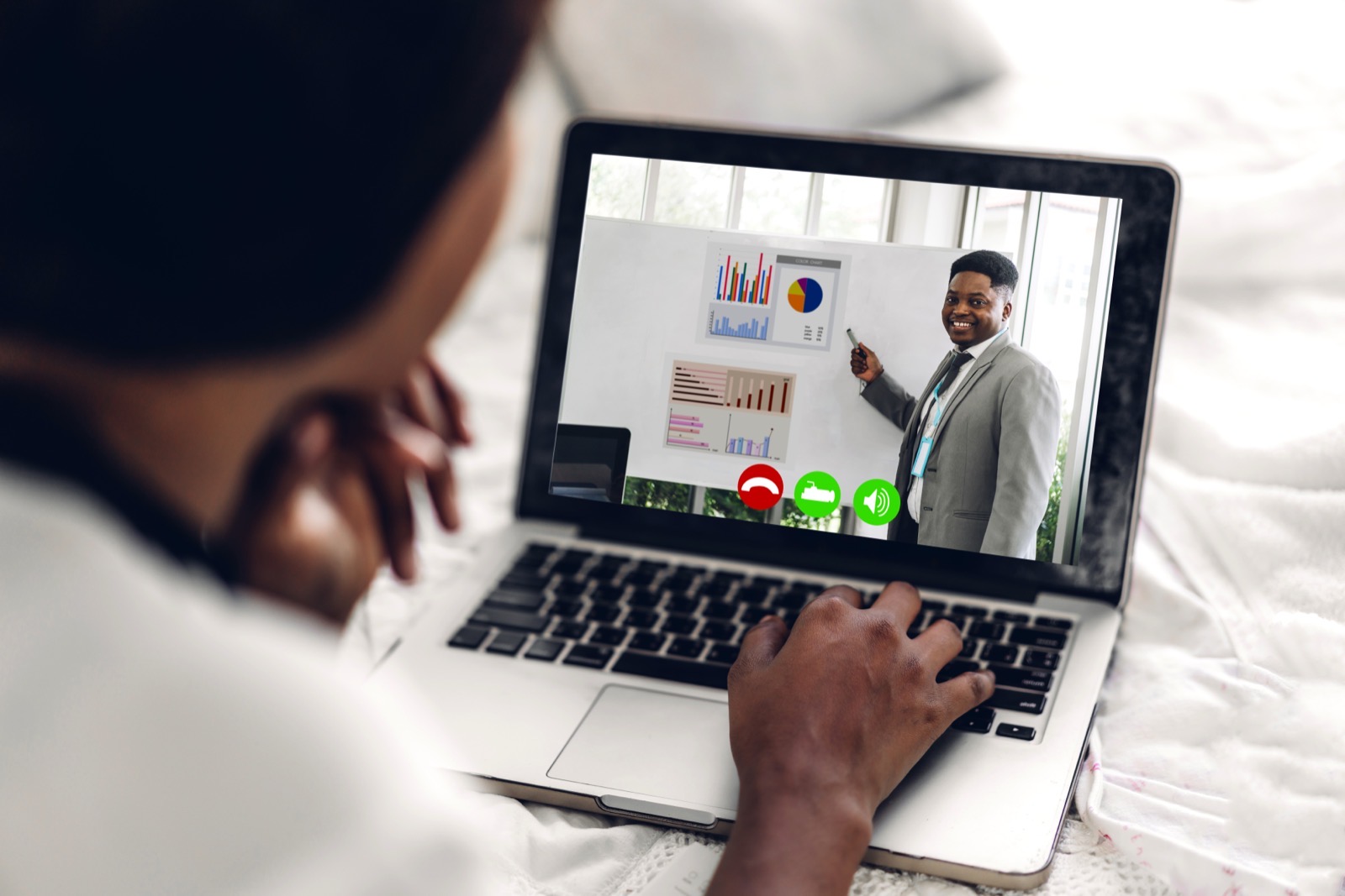A client and a consultant on a live video consultation